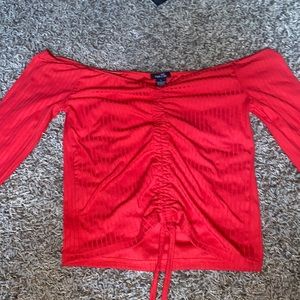 A off the shoulder long sleeve, red.
